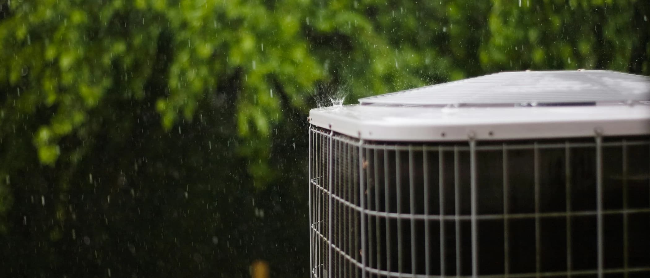 Outdoor cooling unit in heavy rain
